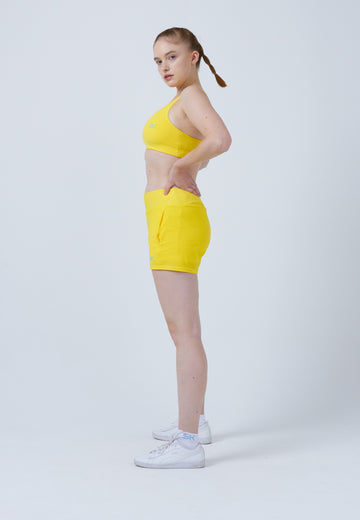 Mädchen & Damen und Gender Advantage Tennis Shorts mit Ballhalter, gelb von SPORTKIND