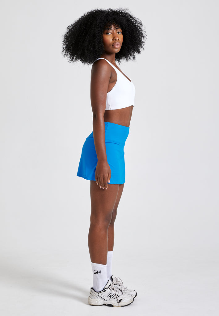 Mädchen & Damen Basic Tennisrock / Skort, cyan blau von SPORTKIND