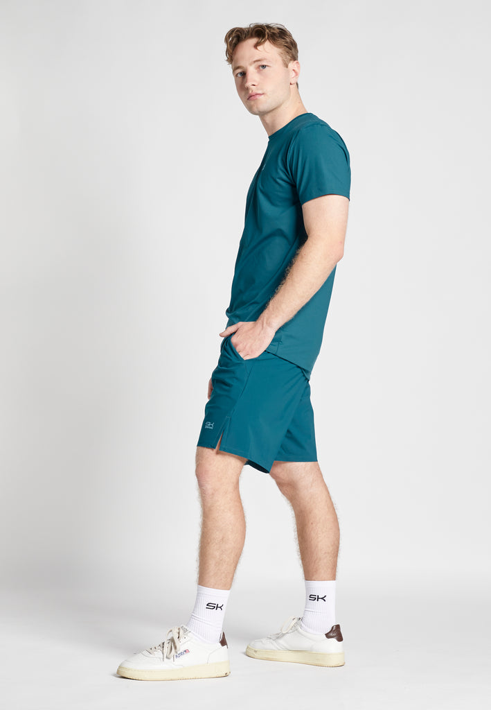 Jungen & Herren Tennis Shorts Performance fuer Herren & Jungen, petrol gruen von SPORTKIND