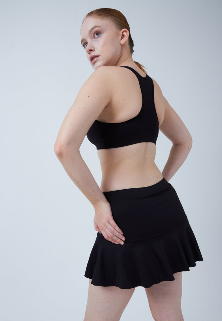 Mädchen & Damen und Gender Glockiger Tennisrock / Skort, schwarz von SPORTKIND