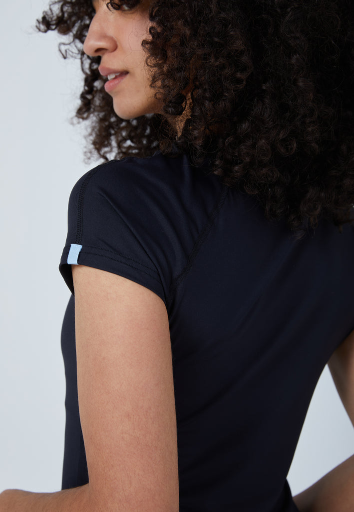 Mädchen & Damen und Gender Tennis Capsleeve T-Shirt, schwarz von SPORTKIND