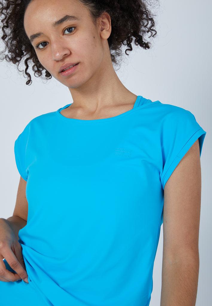 Mädchen & Damen und Gender Tennis Loose Fit Shirt, türkis von SPORTKIND