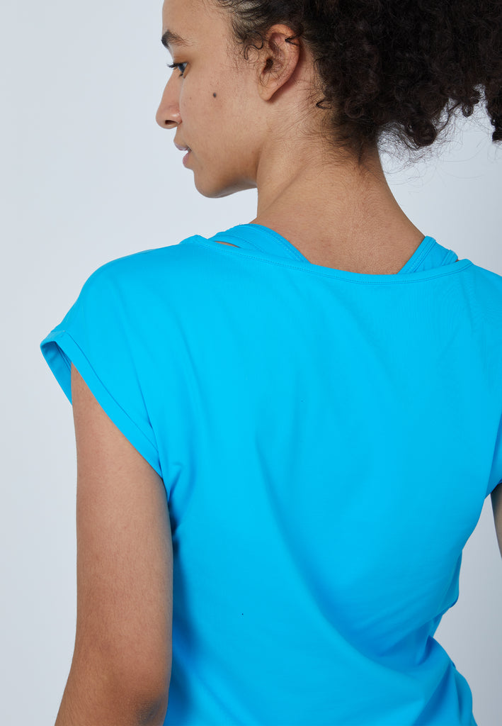 Mädchen & Damen und Gender Tennis Loose Fit Shirt, türkis von SPORTKIND