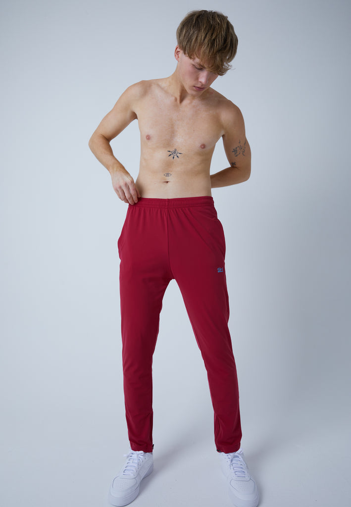 Jungen & Herren und Gender Tennis Trainingshose schmal, bordeaux rot von SPORTKIND