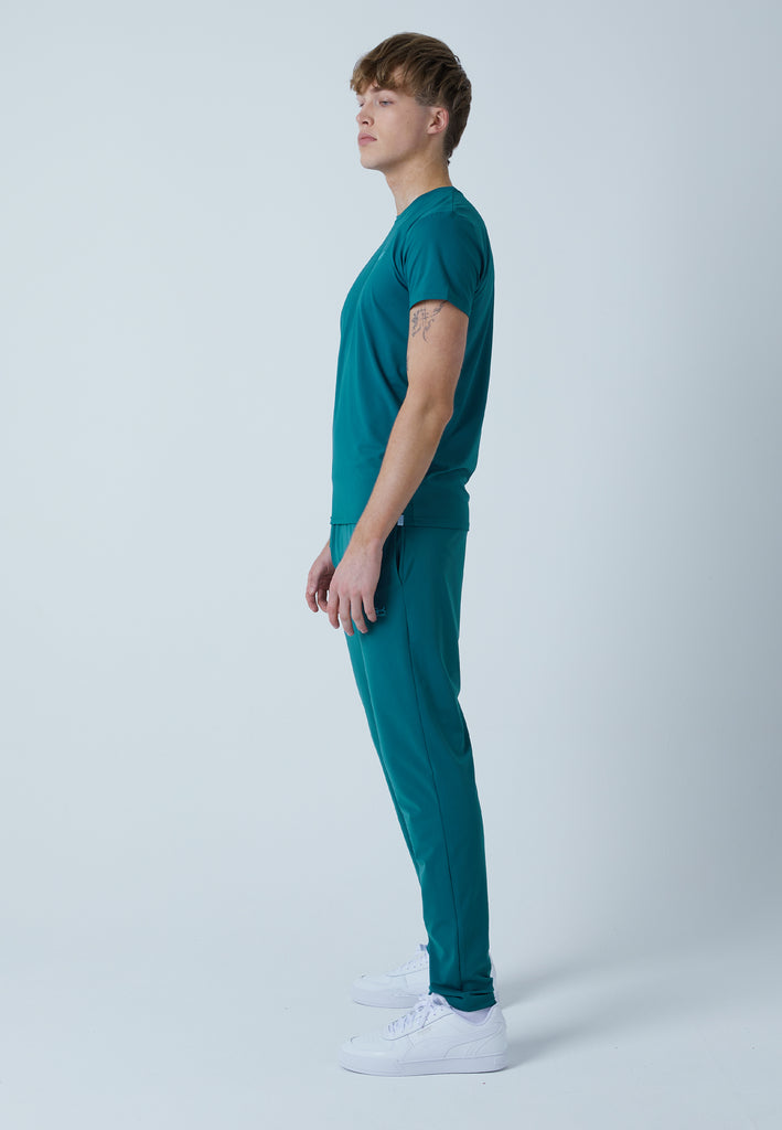 Jungen & Herren und Gender Tennis Trainingshose schmal, petrol grün von SPORTKIND