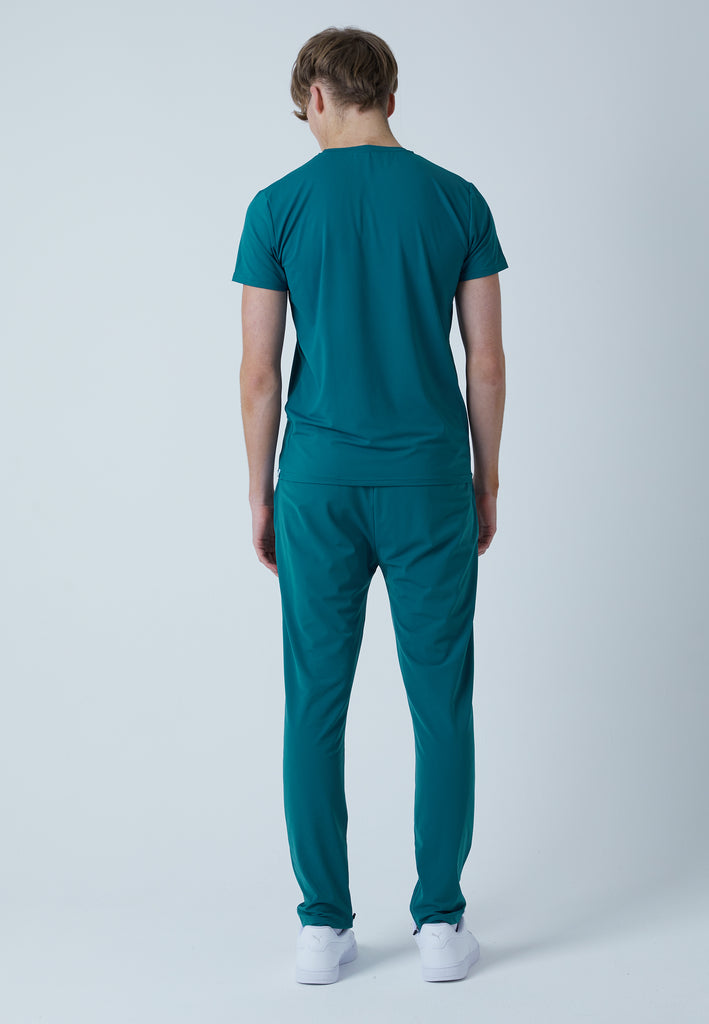 Jungen & Herren und Gender Tennis Trainingshose schmal, petrol grün von SPORTKIND