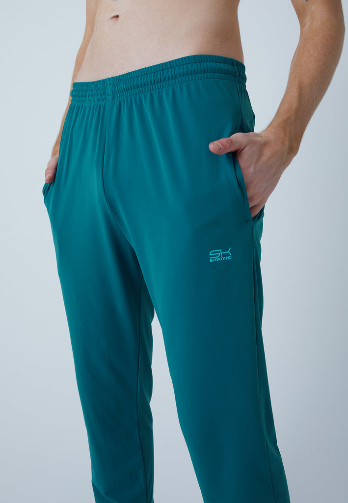 Jungen & Herren und Gender Tennis Trainingshose schmal, petrol grün von SPORTKIND
