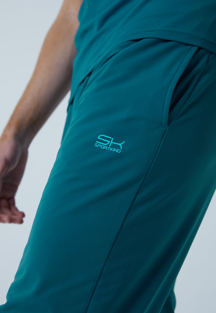 Jungen & Herren und Gender Tennis Trainingshose schmal, petrol grün von SPORTKIND