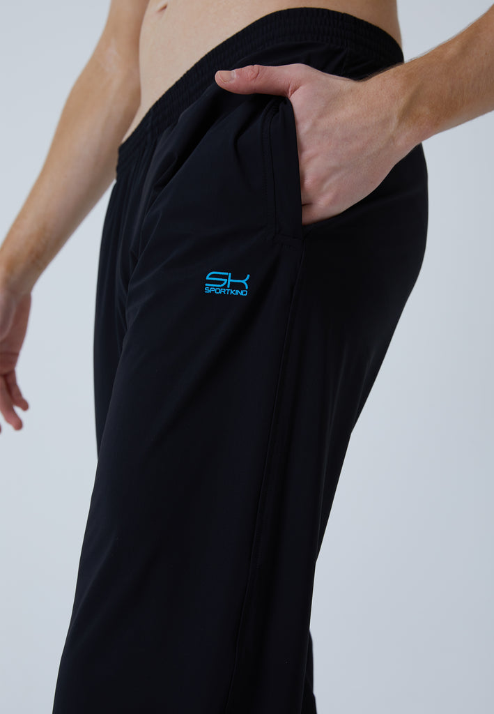 Jungen & Herren und Gender Tennis Trainingshose Woven, schwarz von SPORTKIND